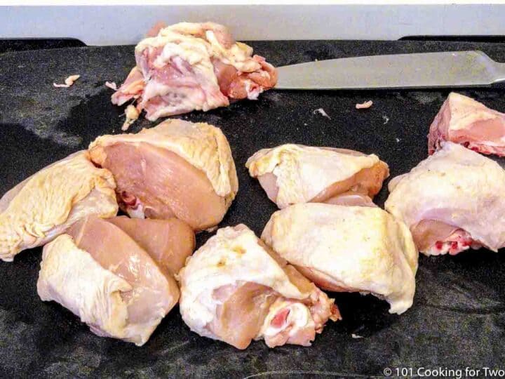 cuttting chicken breasts into parts
