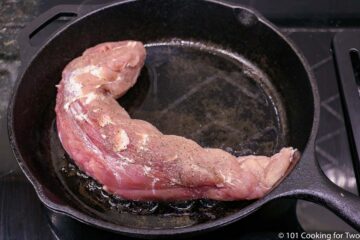 pork tenderloin in a cast iron skillet