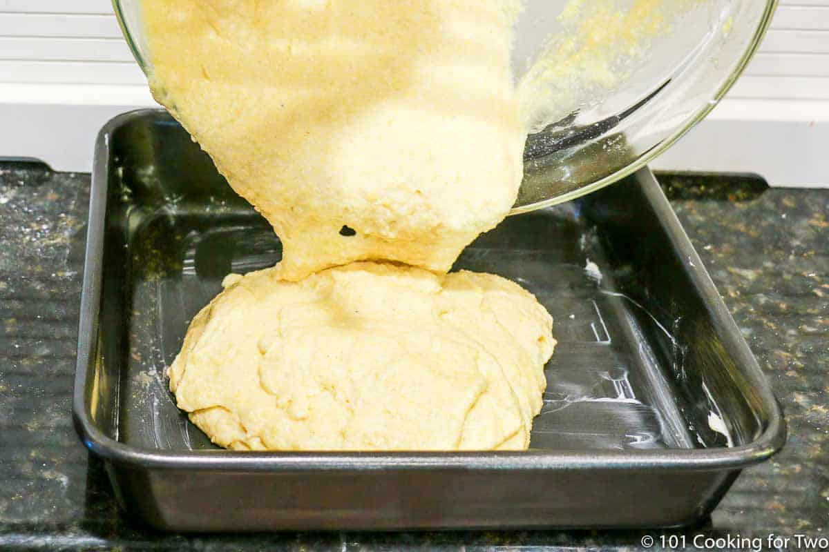 pouring batter into baking pan