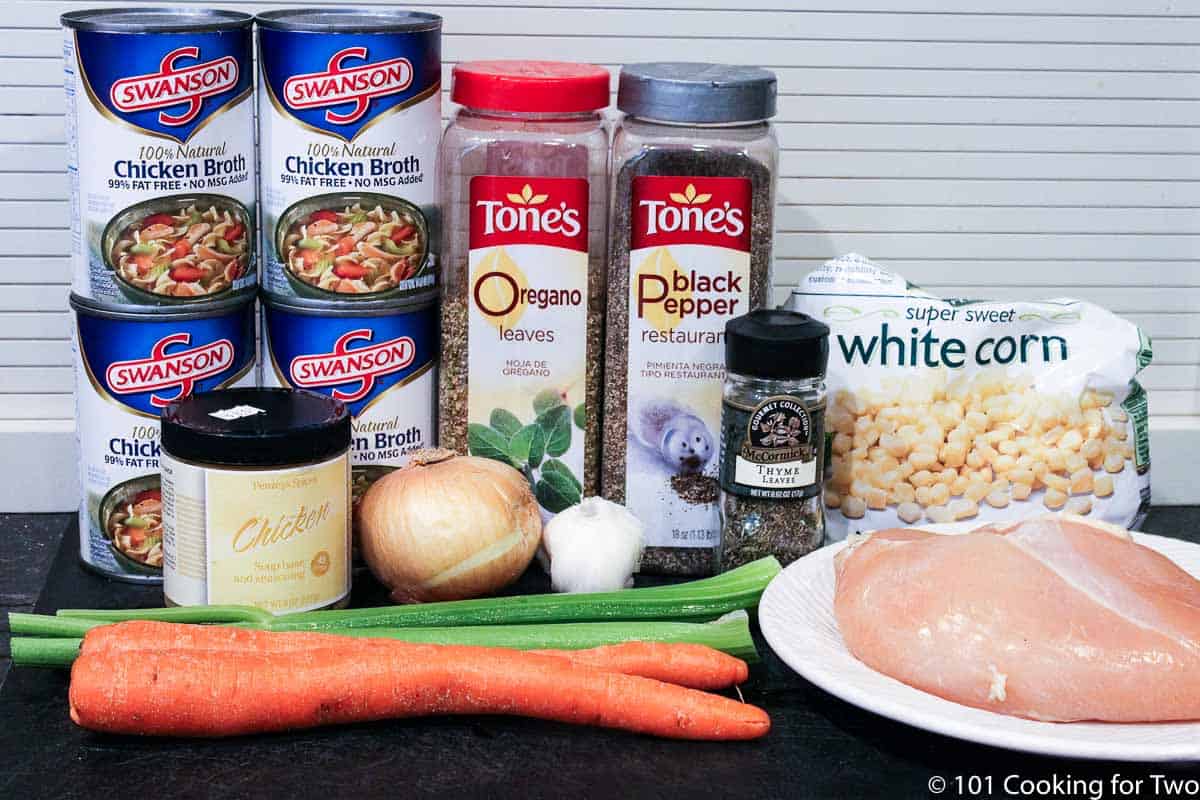 raw chicken breasts and soup ingredients.