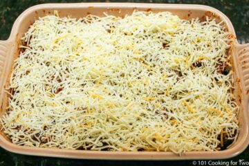 casserole topped with cheese ready for oven
