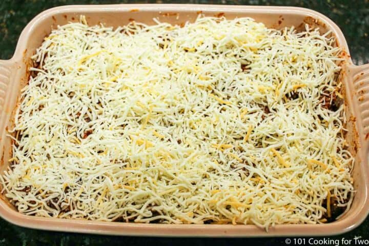 casserole topped with cheese ready for oven