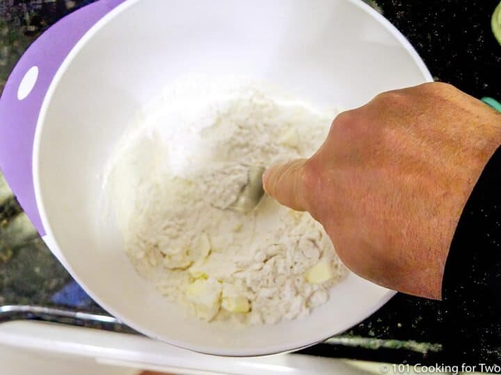 cutting butter into dry ingredients