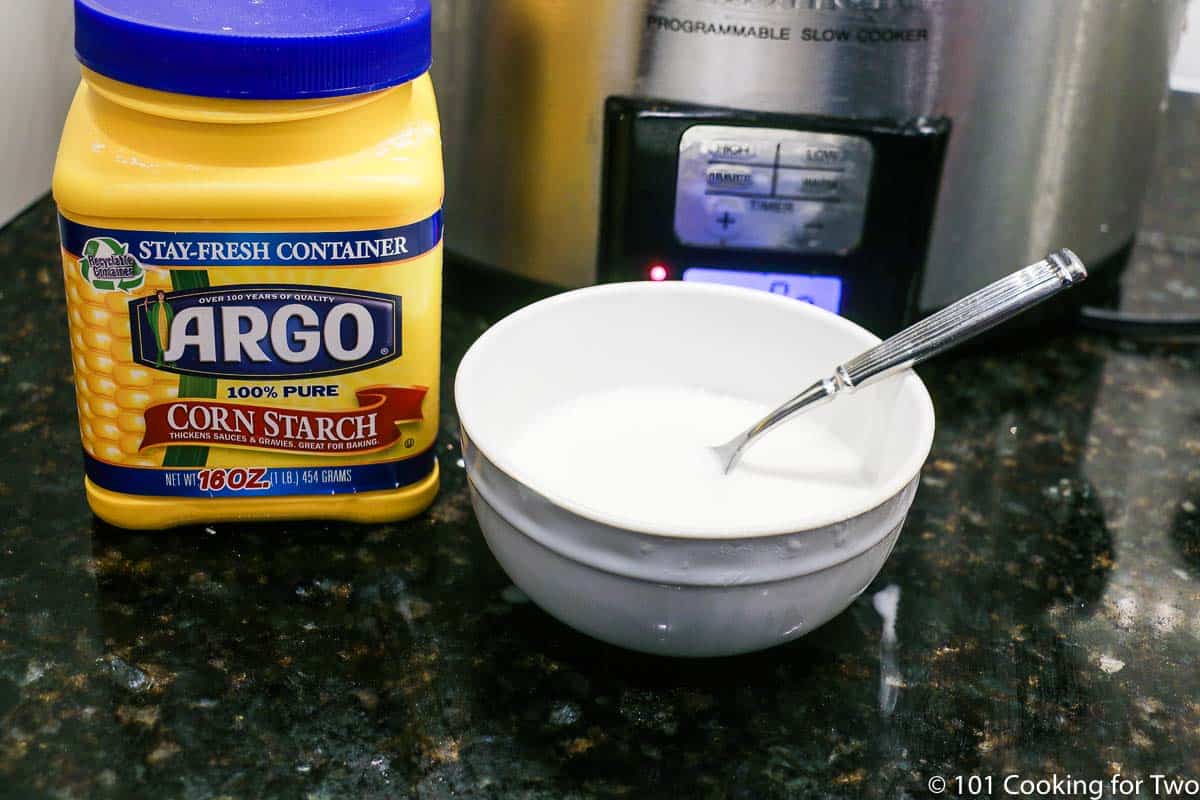 mixing corn starch into a slurry.