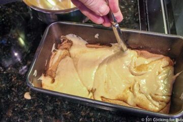 moving a handle though the dough to make swirls