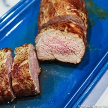 pork tenderloin on blue platter