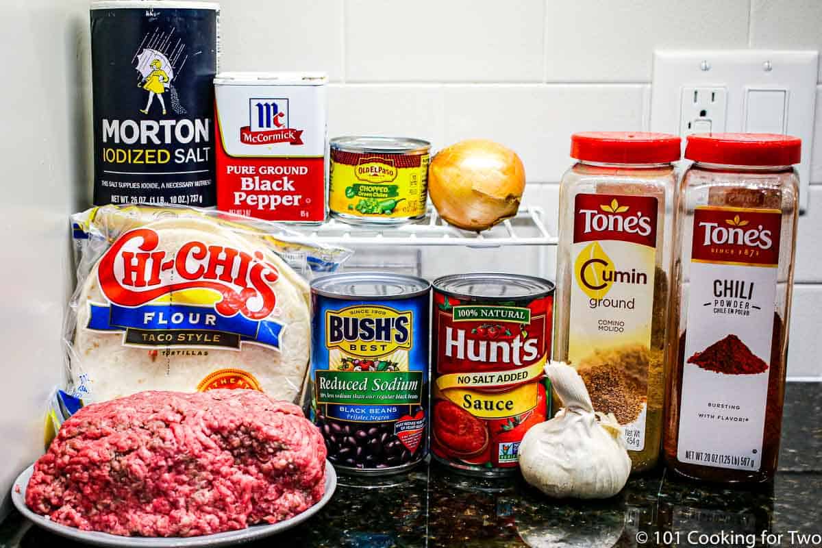 raw burger with tortillas and casserole ingredients