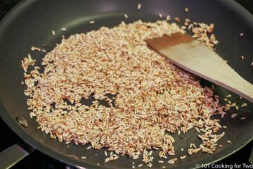 browning rice in skillet