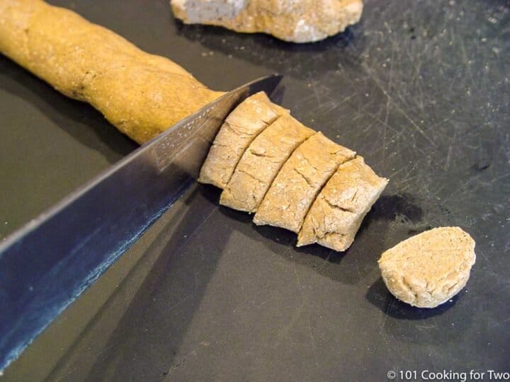 cutting the dough roll into pieces