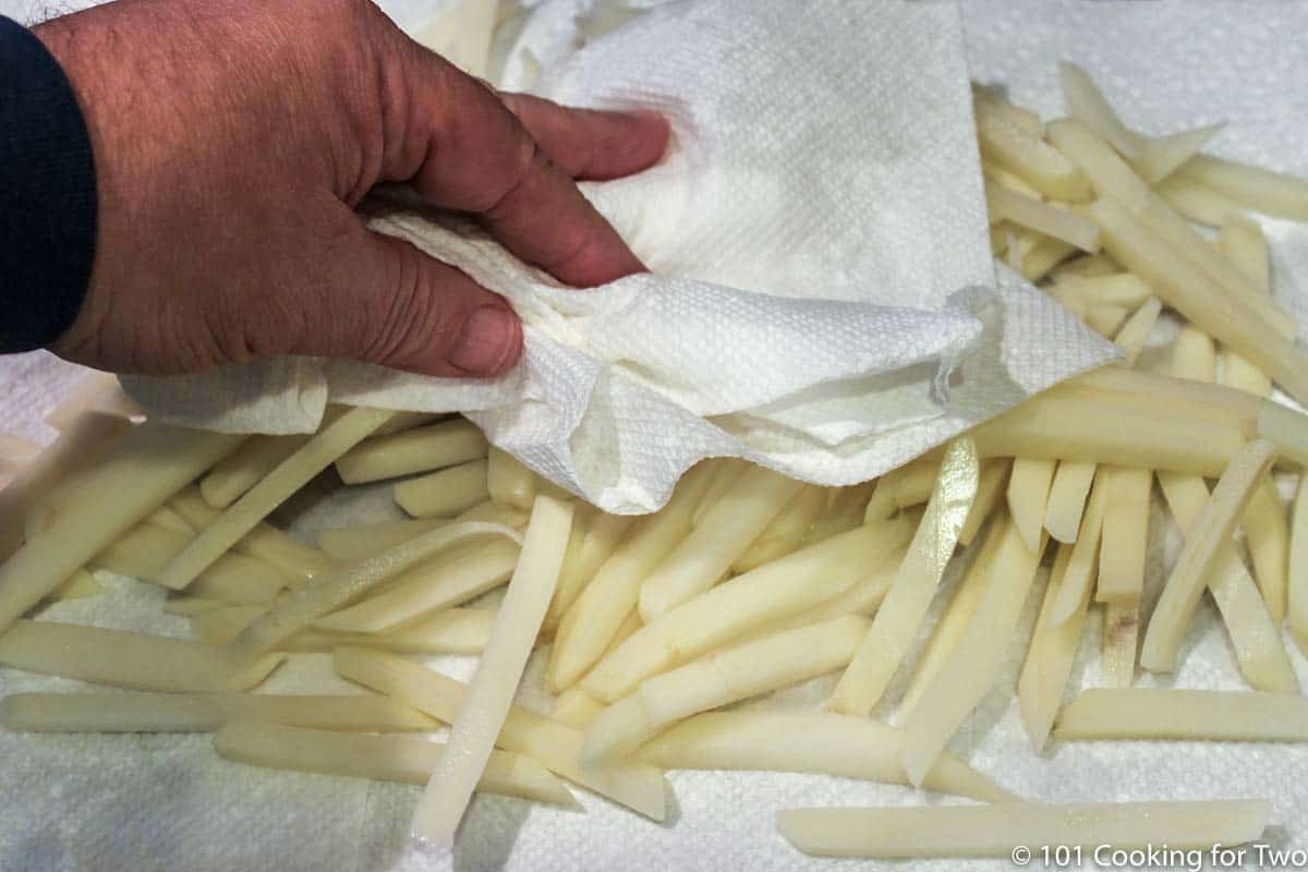 drying French fries with paper towels