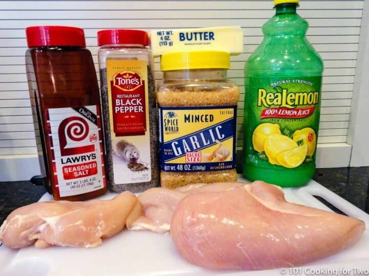 raw chicken breasts with marinade ingredients