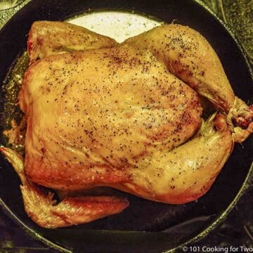 whole roasted chicken cooked in skillet