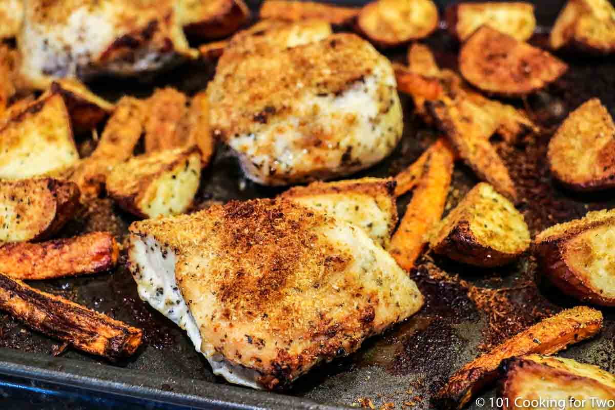 cooked chicken and vegetables on baking tray