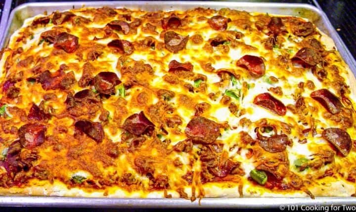 cooked pizza on a sheet pan
