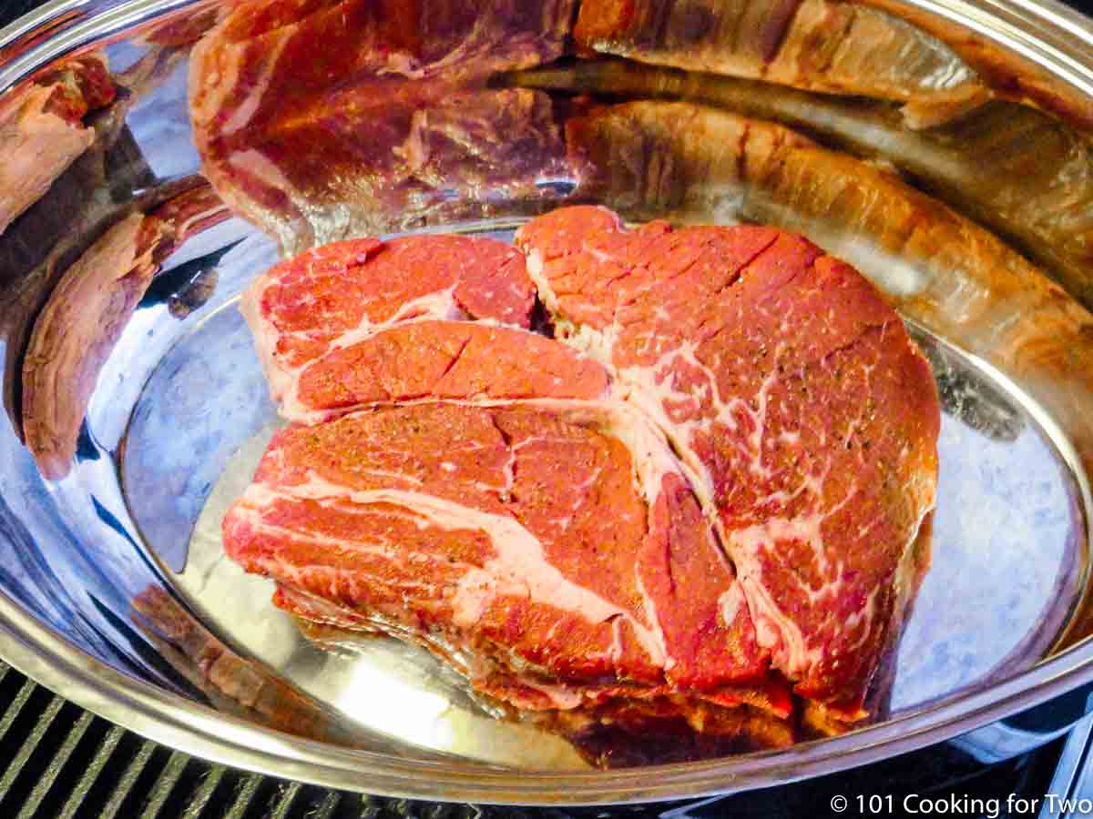 chuck roast in a roasting pan.