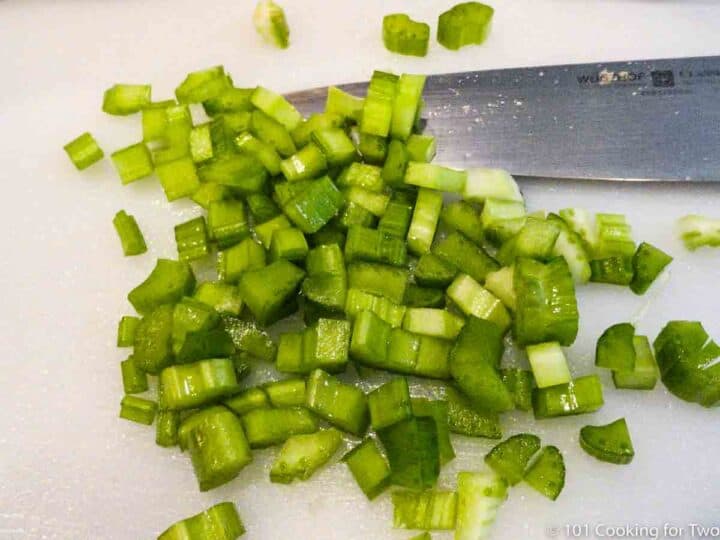 diced celery on a white board