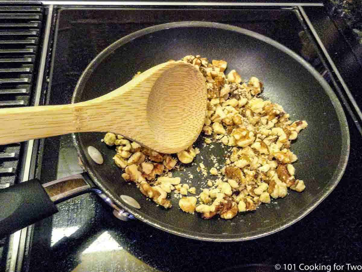 walnuts in a frying pan