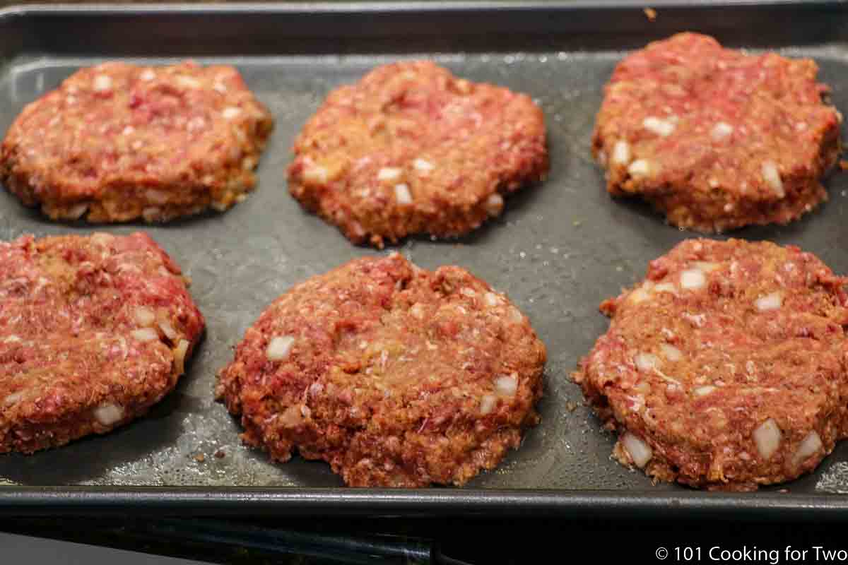 meat mixture formed into burgers with dimples