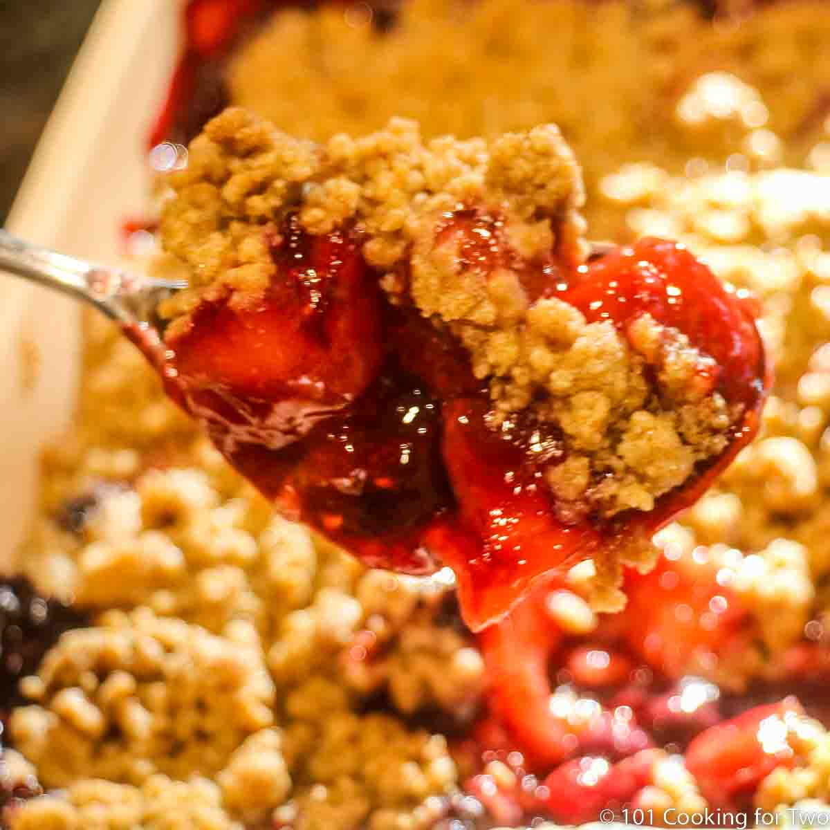 apple berry crumble on a spoon.