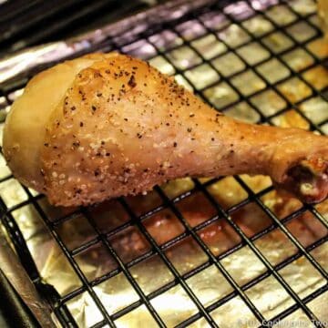baked chicken leg on a rack