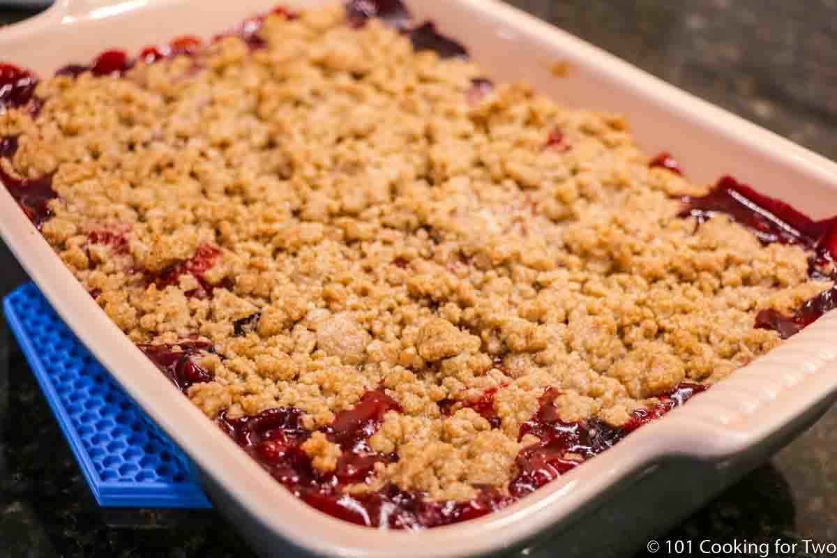 golden brown baked fruit crumble.