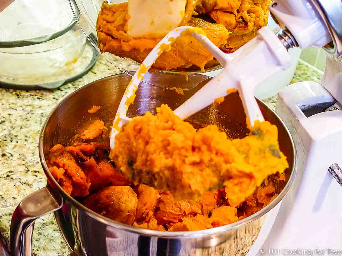 mashing sweet potatoes in a stand mixer