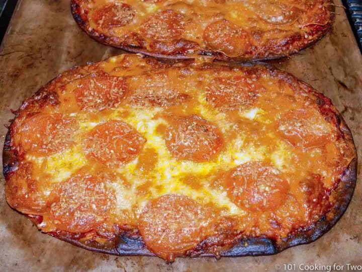 A low-carb tortilla pizza on pizza stone