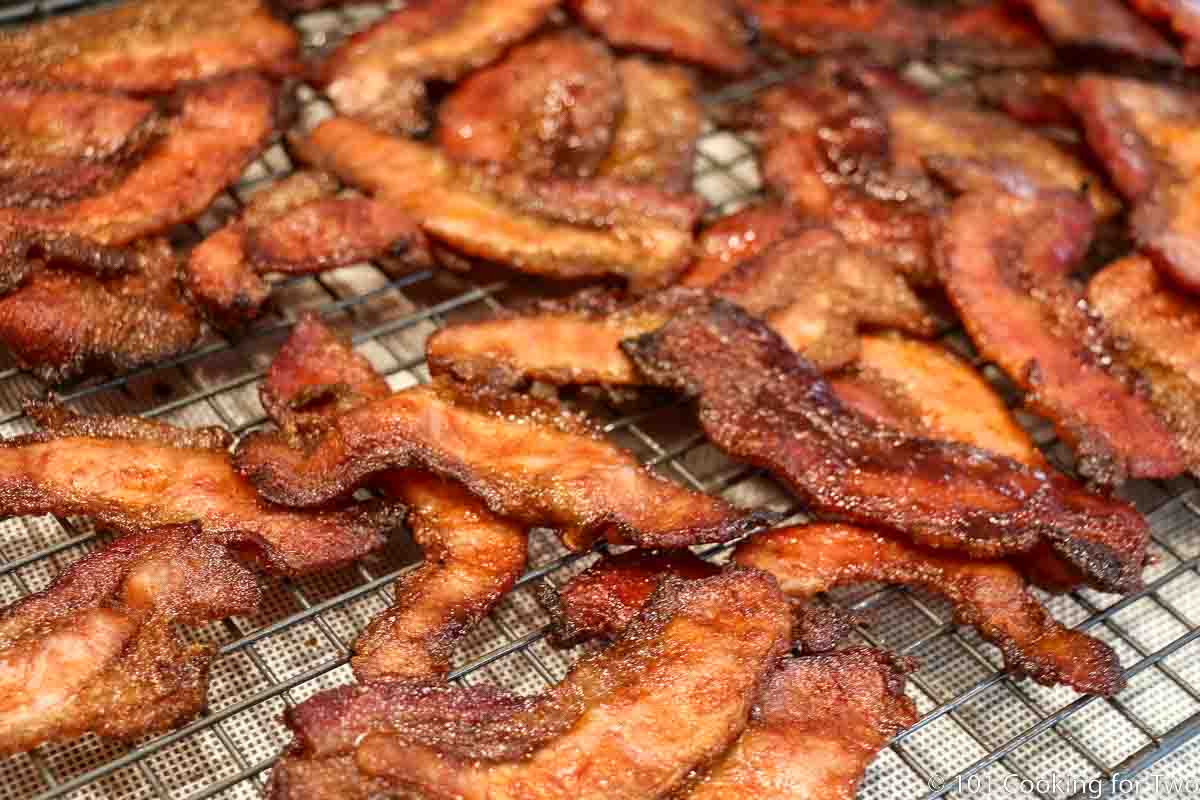 candied bacon cooling on a rack