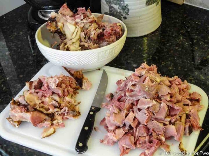 stripping meat off the ham bone