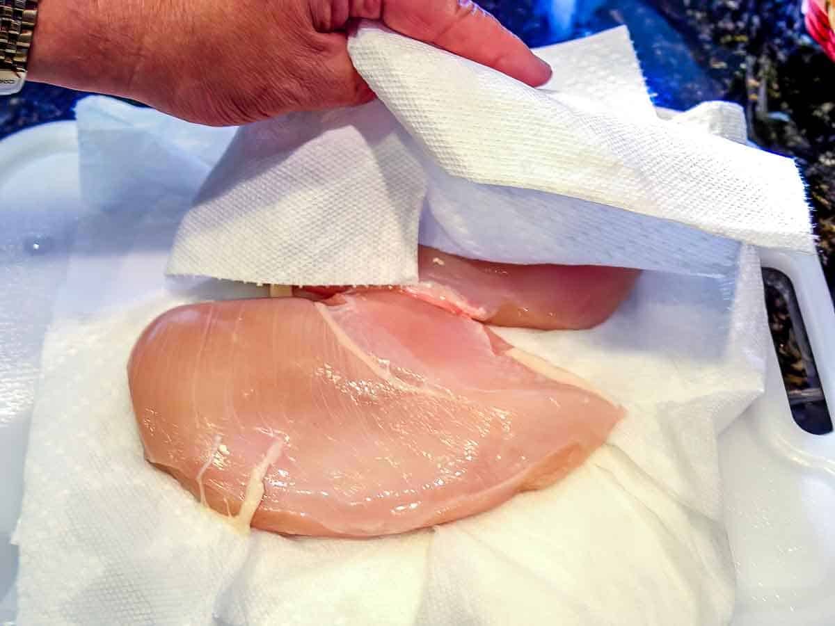 trim and pat dry chicken breasts