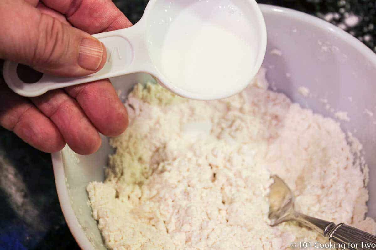 adding buttermilk to flour mixture.