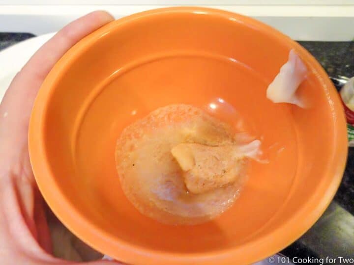 butter with lemon juice and gralic powder in small bowl