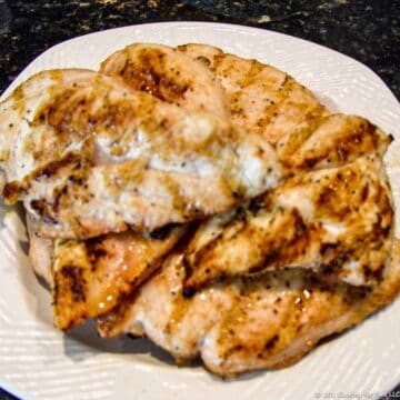 grilled chicken cutlets on a plate