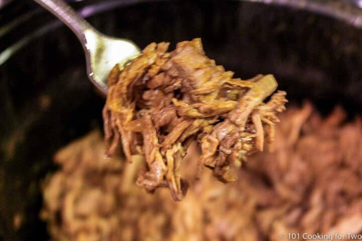 shredded beef on a fork