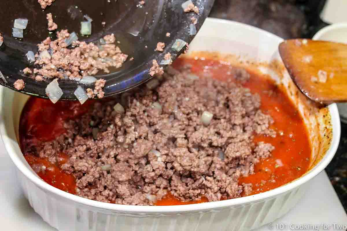 adding browned burger to the sauce