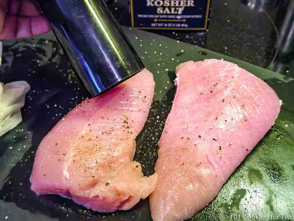 adding pepper to turkey tenderloins.