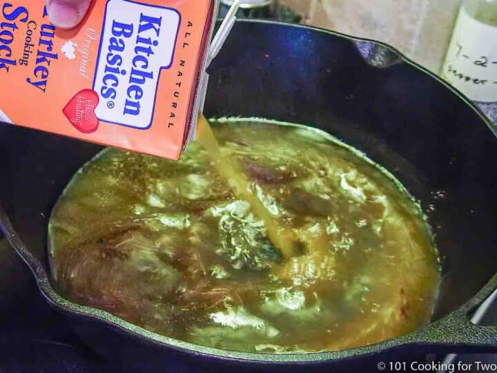 adding turkey stock to pan for gravy