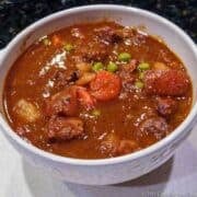 beef stew in a white bowl