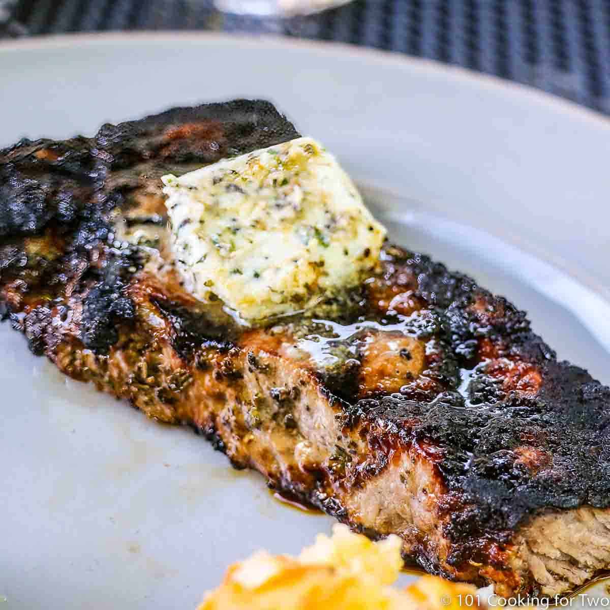 blue cheese compound butter on strip steak.