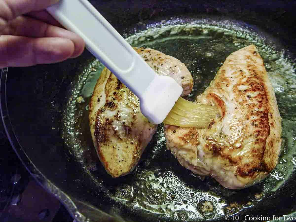 brushing tenderloins with butter.