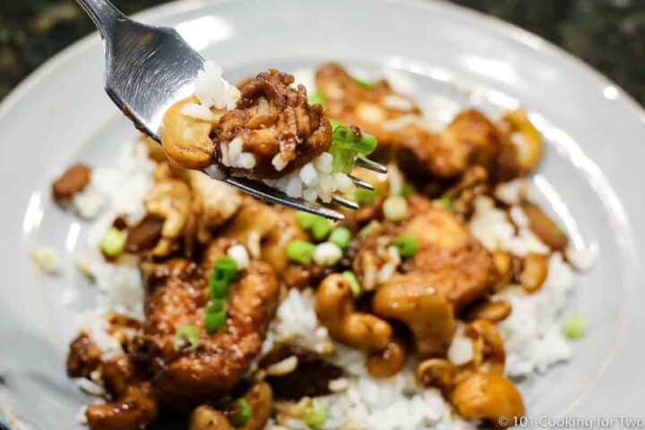 cashew chicken on a fork