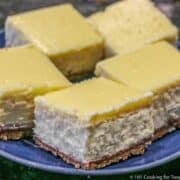Cheesecake bars on a blue plate