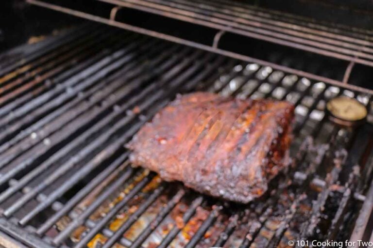 cooked brisket on the grill