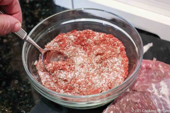 mixing rub in a glass bowl