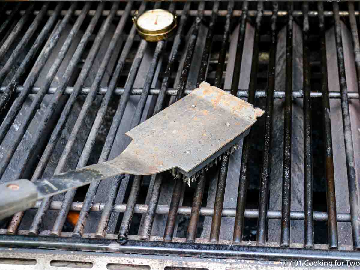 cleaning and oiling grill grates.