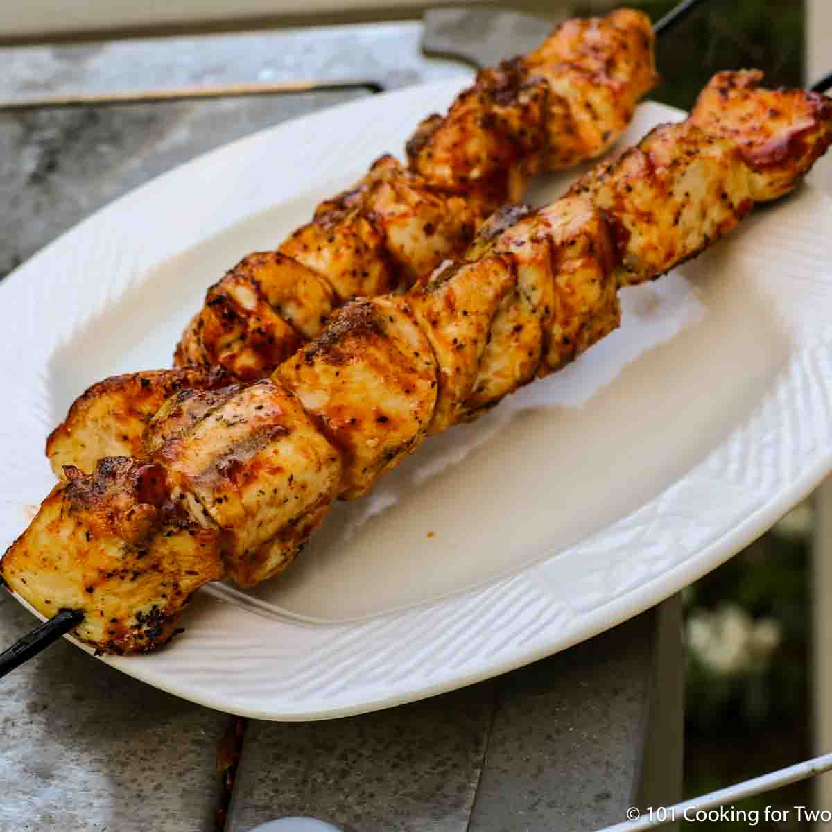 BBQ Chicken Skewers on a white plate