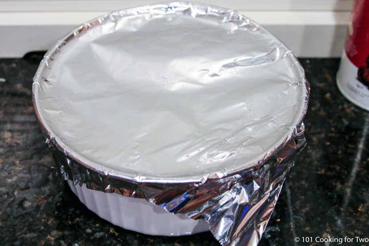 casserole dish sealed with aluminum foil