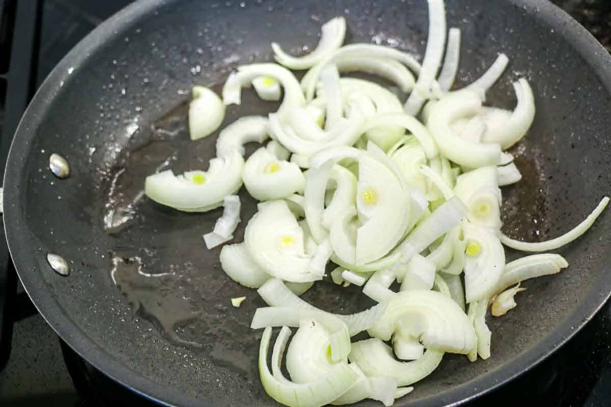 cooking onions in skillet.