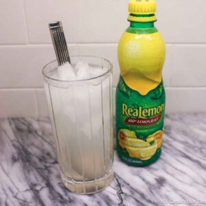 glass of lemonade with lemon juice