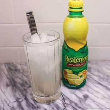 glass of lemonade with lemon juice